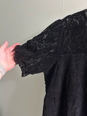 Anthropologie black textured lace cut out puff sleeve top
